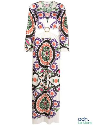 the dress is multicolored and has a belt around the waist