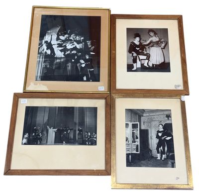 four framed black and white photographs of people in a living room