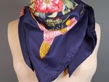 a close up of a mannequin torso with a scarf on it