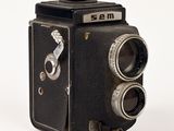an old photo of an old camera on a white background