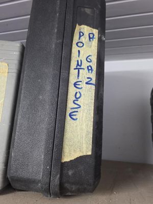 two suitcases that are sitting next to each other on a shelf