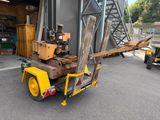 a truck with a crane attached to the back of it