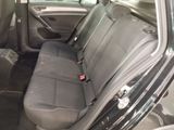 the back seats of a car are empty and the passenger seat is empty