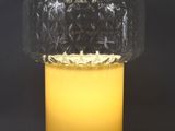 a close up of a lamp that is on a table