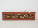 an antique chinese carved wood panel with a scene of a city