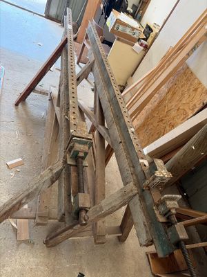a pile of wood sitting on the floor in a room