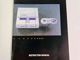 an instruction manual for the nintendo super nintendo game console