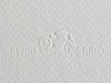 a close up of a white paper with the words, ' i love you ' written on it