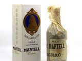 une bouteille de Marmell à côté d'une boîte de Marmell