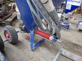 an image of a machine that is working on a piece of machinery