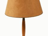 an image of a table lamp with a brown shade on it