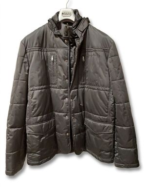 jacket on a hanger on a white wall with a white background