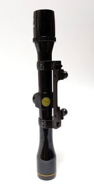 an image of a black telescope on a white background