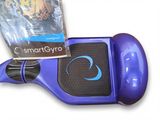 a blue hoveboard with a bag of gadgets on it