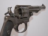 an old gun that is sitting on top of a table