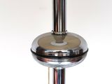 a close up of a table lamp with a light on it