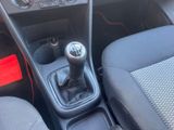 an image of a car interior with a manual gear box