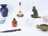 many different types of glass items on the table