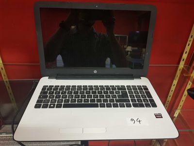 a laptop computer that is sitting on a table