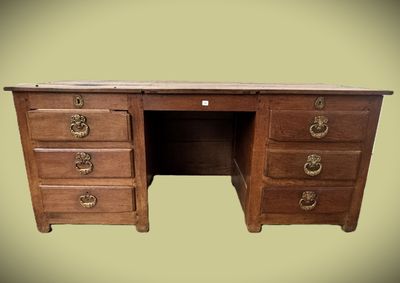 an image of a wooden desk with drawers and drawers