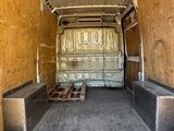 an image of the inside of a van with a mattress