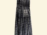 the dress is black and white with a tie dye pattern on it
