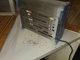 a toaster that is sitting on a table in a kitchen