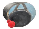 a black and blue drum with a red pom pom on it