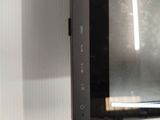 a television that is hanging on the wall in the room