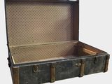 an old suitcase that is open on a white background