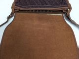 leather and sued cross body bag with a brown lining