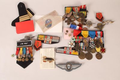 a lot of medals and other items that are on the table