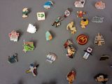 a lot of pins that are on a table