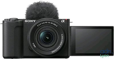 a black camera with a microphone attached to it