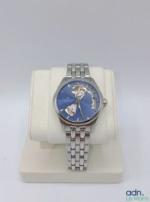 a watch that is sitting on a display stand