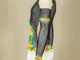 an image of a mannequin wearing a black and green top