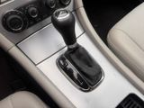 a close up of a car ' s gear lever in the center of the car