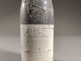 a bottle of wine that is sitting on a table