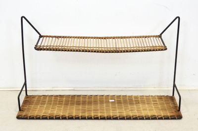 an image of a shelf with two baskets on top of it