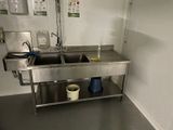 a sink and a sink in a small room