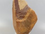 a piece of bread that is on a glass stand