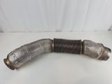 a close up of a metal pipe on a white surface