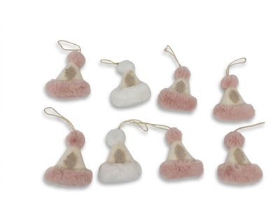 six petites décorations de Noël roses et blanches sur un fond blanc