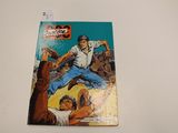 la couverture d'une bande dessinée représentant un homme sur une planche de surf