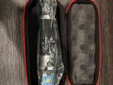 a red case with a bottle of water in it
