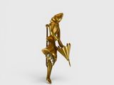 a gold statue of a woman holding an umbrella on a white surface