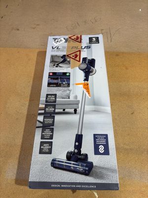 the box of the vacuum is open on the table