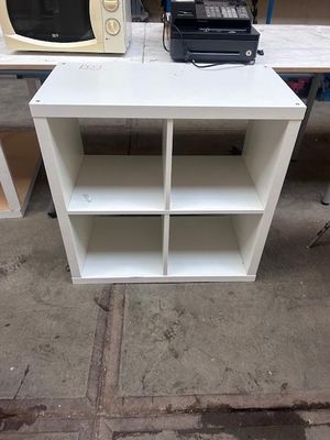 a microwave and a microwave oven sitting on a table