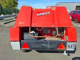 an image of a red truck with a big engine