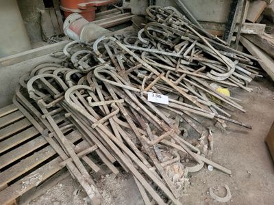 a pile of old metal items sitting on the ground